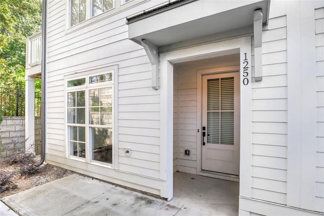 doorway to property featuring a patio area