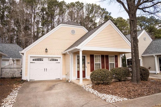 view of front of house featuring a garage and covered porch