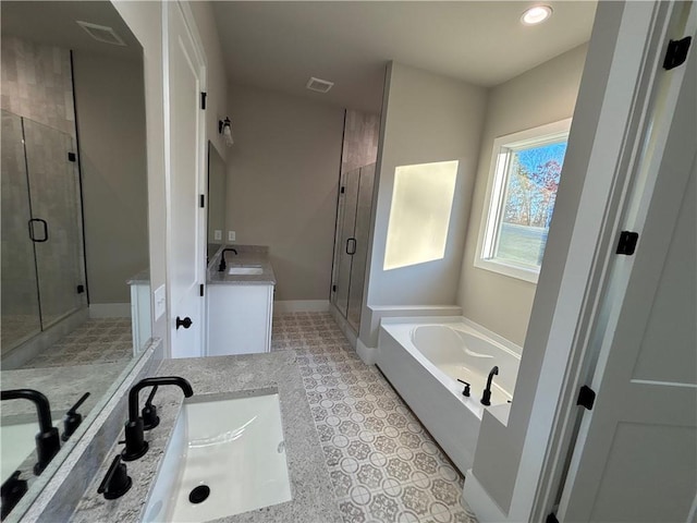 bathroom featuring tile patterned flooring, vanity, and independent shower and bath