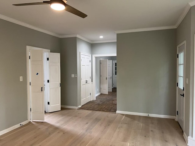 730 Redlion Run, Alpharetta, GA 30022 - unfurnished bedroom featuring light wood-type flooring, crown molding, baseboards, recessed lighting, and ceiling fan