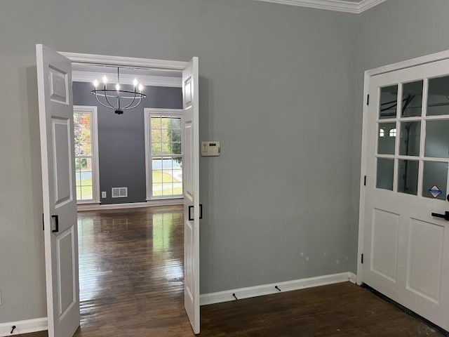 730 Redlion Run, Alpharetta, GA 30022 - entryway with ornamental molding, a chandelier, dark wood-type flooring, and baseboards