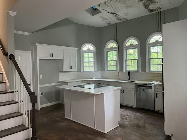 730 Redlion Run, Alpharetta, GA 30022 - kitchen featuring stainless steel dishwasher, a sink, black electric cooktop, backsplash, and light countertops