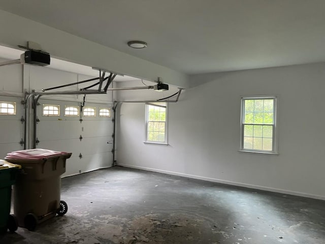 730 Redlion Run, Alpharetta, GA 30022 - garage featuring a garage door opener and baseboards
