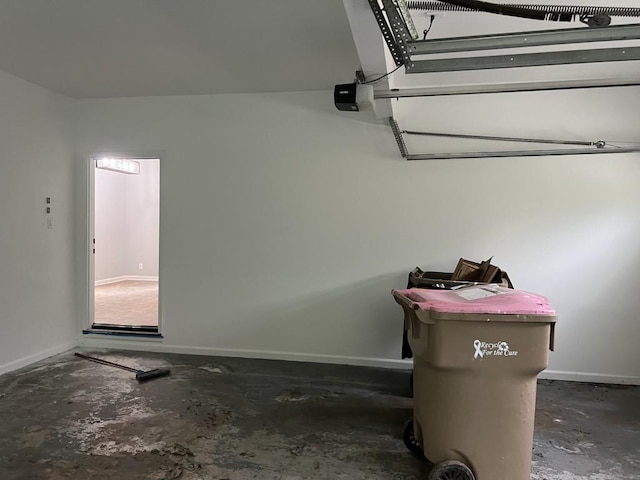 730 Redlion Run, Alpharetta, GA 30022 - garage featuring baseboards and a garage door opener