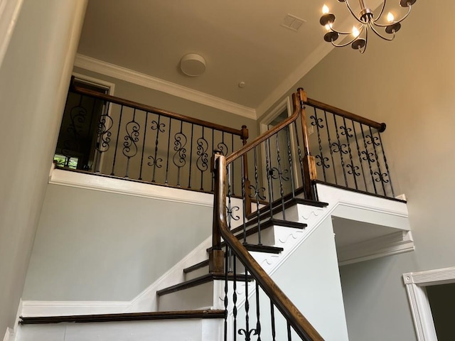 730 Redlion Run, Alpharetta, GA 30022 - stairway with crown molding and a chandelier