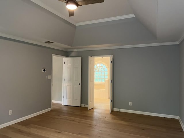 730 Redlion Run, Alpharetta, GA 30022 - empty room with ceiling fan, crown molding, baseboards, wood finished floors, and lofted ceiling