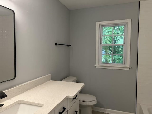 730 Redlion Run, Alpharetta, GA 30022 - full bathroom featuring vanity, toilet, baseboards, and tub / shower combination