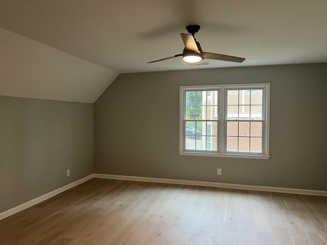 730 Redlion Run, Alpharetta, GA 30022 - additional living space with lofted ceiling, wood finished floors, and baseboards