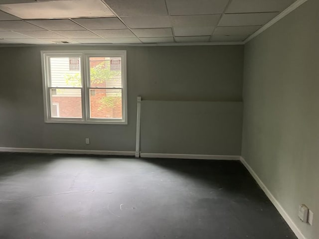 730 Redlion Run, Alpharetta, GA 30022 - unfurnished room with concrete flooring, baseboards, and a paneled ceiling