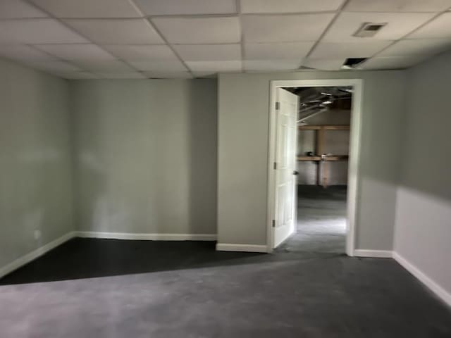 730 Redlion Run, Alpharetta, GA 30022 - empty room with baseboards, a paneled ceiling, and concrete floors