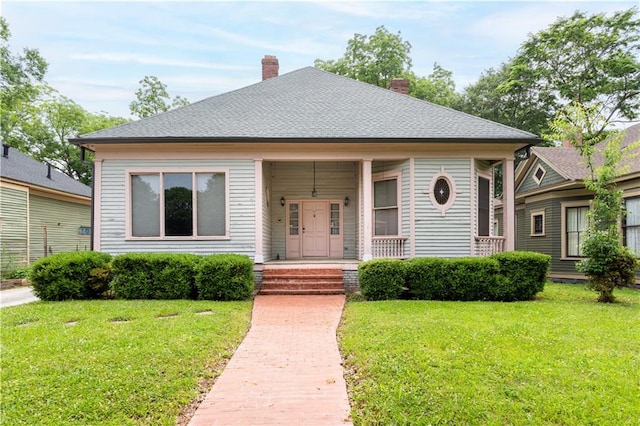 bungalow with a front yard