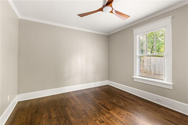 empty room with ornamental molding, baseboards, dark wood-style floors, and a ceiling fan
