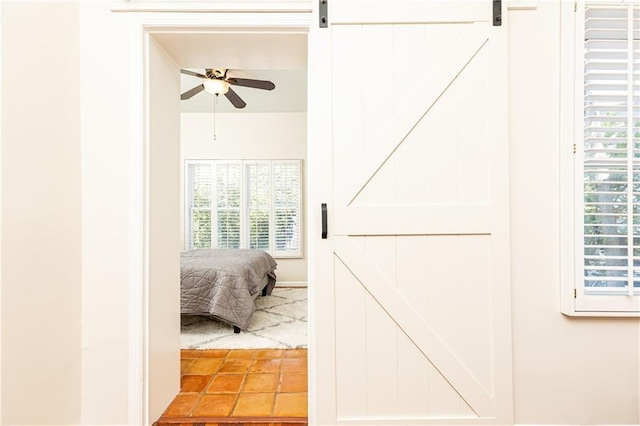 bedroom with a barn door