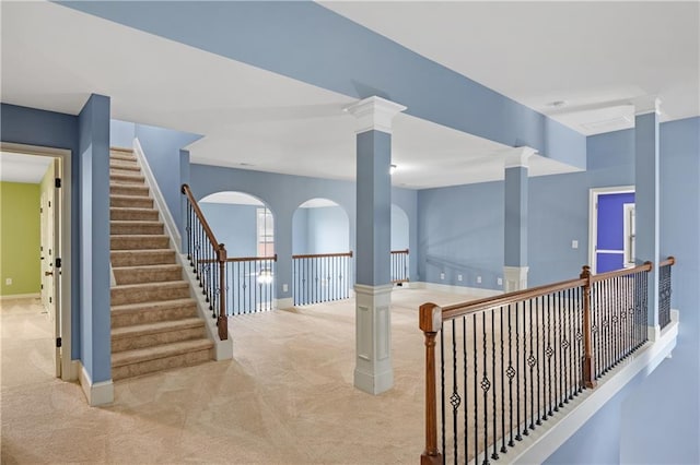 staircase with carpet flooring and baseboards