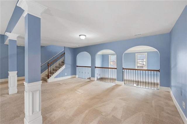 unfurnished room featuring visible vents, baseboards, and carpet floors