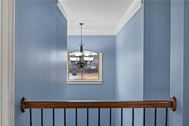 interior details featuring a notable chandelier and ornamental molding