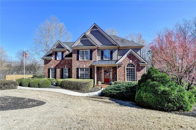 view of front of home with brick siding