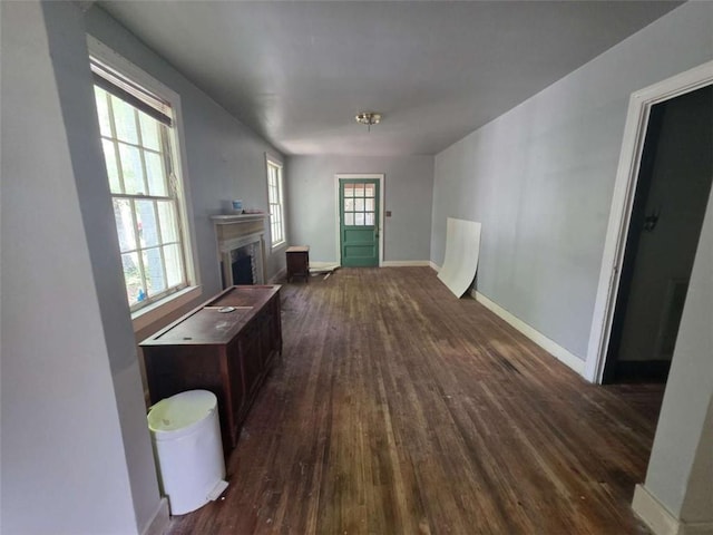 1437 Troupe St, Augusta, GA 30904 - unfurnished living room featuring dark wood-style flooring and a fireplace