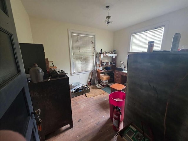 1437 Troupe St, Augusta, GA 30904 - bedroom featuring hardwood / wood-style flooring, heating fuel, and an office area