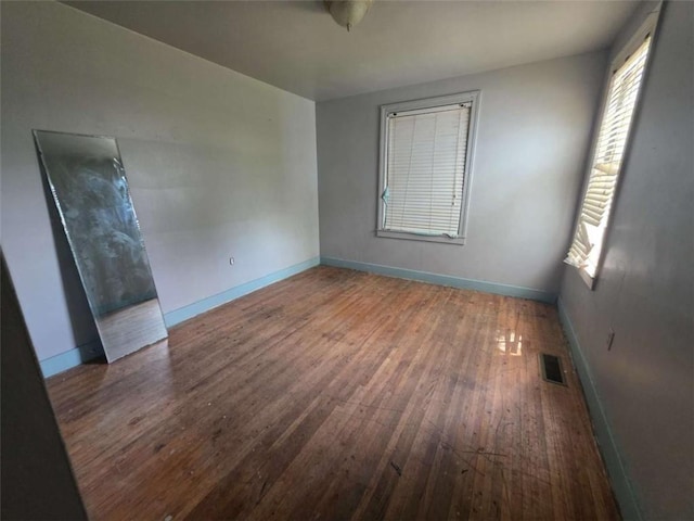1437 Troupe St, Augusta, GA 30904 - empty room featuring wood-type flooring and baseboards