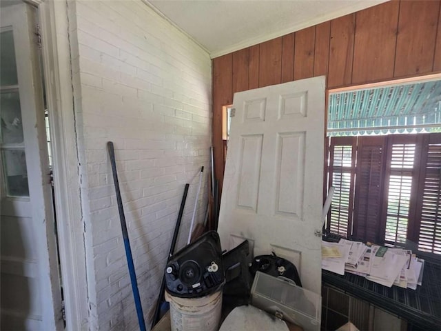 1437 Troupe St, Augusta, GA 30904 - bathroom with brick wall and wooden walls