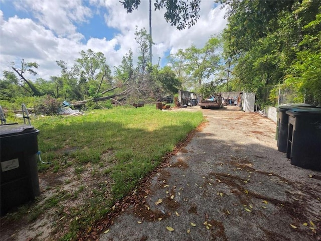 1437 Troupe St, Augusta, GA 30904 - view of yard featuring asphalt driveway