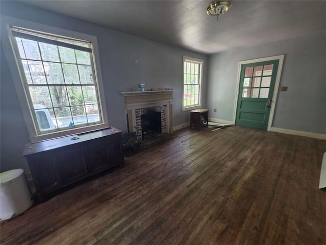 1437 Troupe St, Augusta, GA 30904 - unfurnished living room with dark wood-style floors and a fireplace