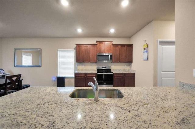 157 Oliver Dr, Locust Grove, GA 30248 - kitchen featuring a sink, light stone countertops, stainless steel appliances, and recessed lighting