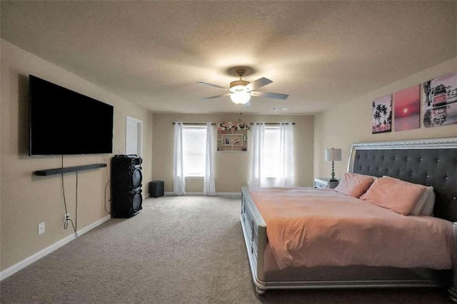 157 Oliver Dr, Locust Grove, GA 30248 - carpeted bedroom featuring baseboards and ceiling fan
