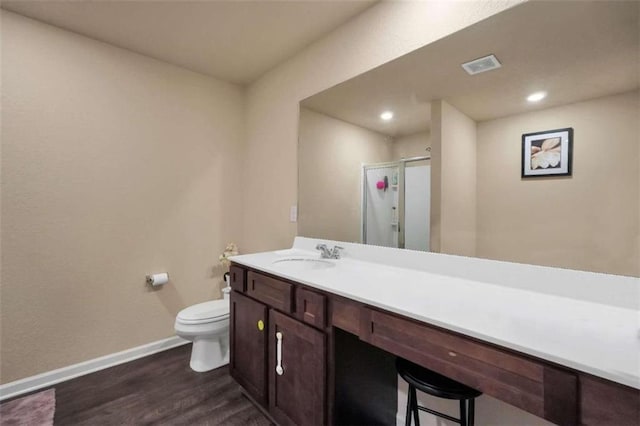 157 Oliver Dr, Locust Grove, GA 30248 - full bathroom featuring visible vents, a stall shower, wood finished floors, baseboards, and toilet