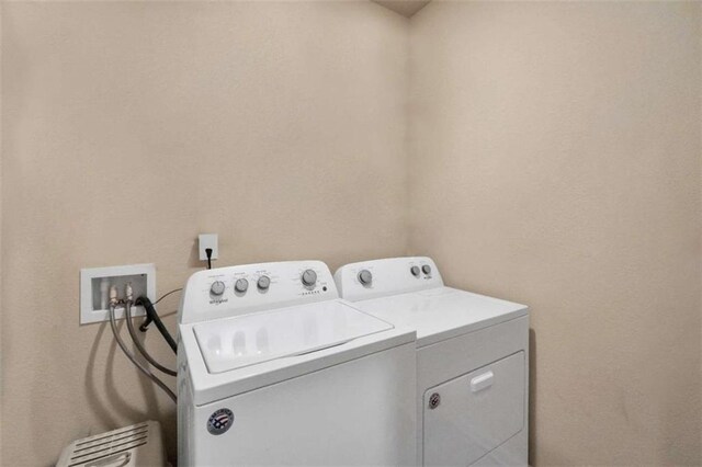 157 Oliver Dr, Locust Grove, GA 30248 - clothes washing area featuring laundry area and independent washer and dryer