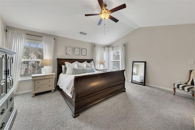 bedroom with light colored carpet, a ceiling fan, baseboards, vaulted ceiling, and visible vents