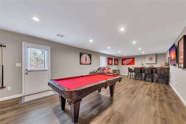 rec room featuring baseboards, indoor bar, wood finished floors, pool table, and recessed lighting