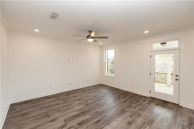 706 Dodd Ln Unit 157, Buford, GA 30518 - unfurnished room with crown molding, healthy amount of natural light, a ceiling fan, dark wood finished floors, and baseboards