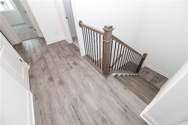 706 Dodd Ln Unit 157, Buford, GA 30518 - staircase featuring wood finished floors and baseboards