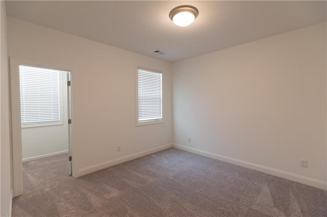 706 Dodd Ln Unit 157, Buford, GA 30518 - carpeted empty room featuring baseboards