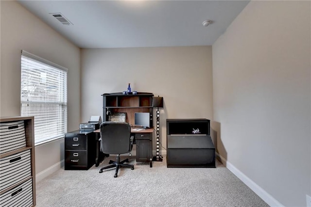 office space featuring light colored carpet