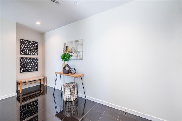 interior space featuring dark tile patterned floors