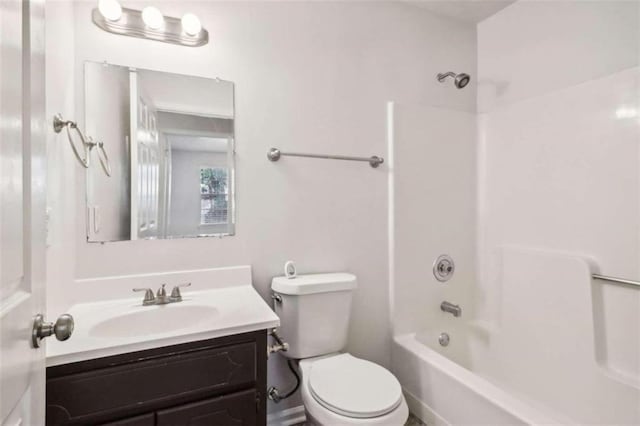 full bathroom featuring vanity, shower / bath combination, and toilet
