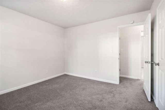 empty room with carpet floors