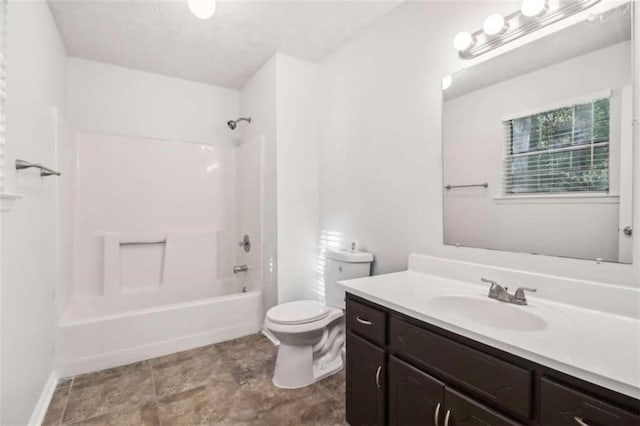 full bathroom with vanity, toilet, and bathtub / shower combination