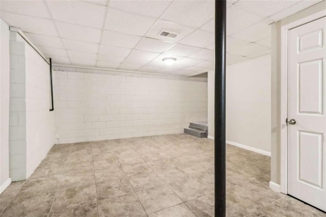 basement with a drop ceiling