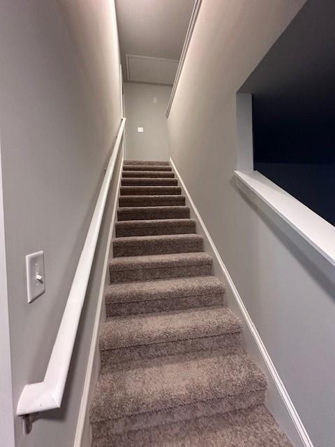 30 Barton Ln, Covington, GA 30016 - stairs with attic access