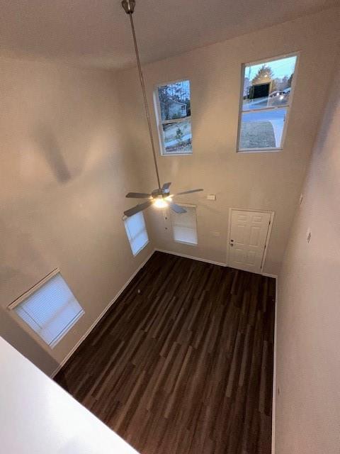 30 Barton Ln, Covington, GA 30016 - interior space featuring dark wood-style flooring and ceiling fan