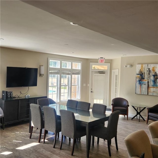 dining area with light hardwood / wood-style flooring