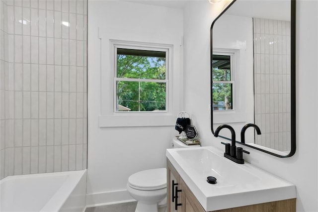1643 Flintwood Dr SE, Atlanta, GA 30316 - bathroom featuring healthy amount of natural light, toilet, vanity, and baseboards