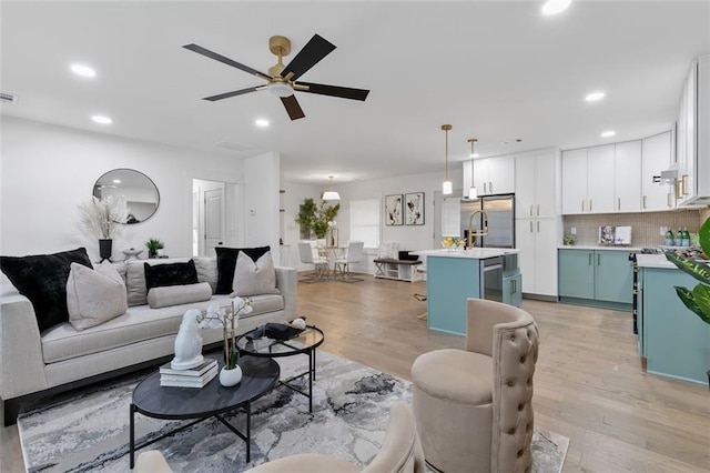1643 Flintwood Dr SE, Atlanta, GA 30316 - living area with recessed lighting, light wood-type flooring, and ceiling fan