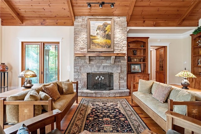 1447 Travis Smith Rd, Clarkesville, GA 30523 - living area featuring wooden ceiling, wood finished floors, and a fireplace