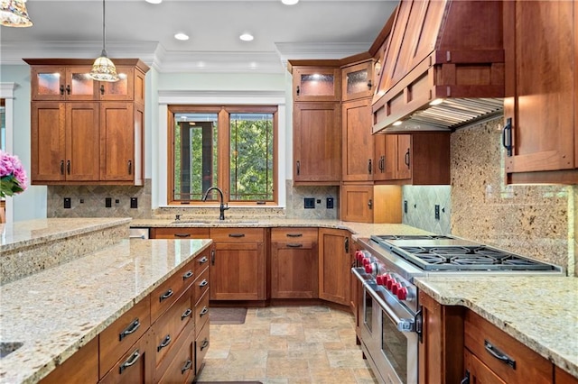 1447 Travis Smith Rd, Clarkesville, GA 30523 - kitchen featuring range with two ovens, premium range hood, a sink, brown cabinetry, and ornamental molding