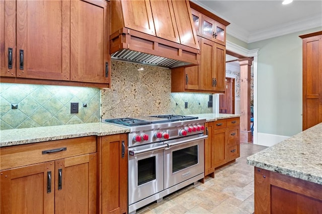 1447 Travis Smith Rd, Clarkesville, GA 30523 - kitchen featuring double oven range, brown cabinetry, ornamental molding, and recessed lighting